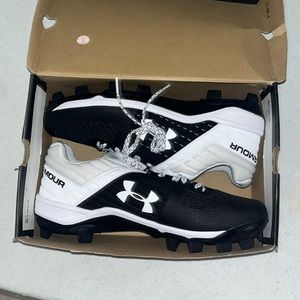White and black cleats